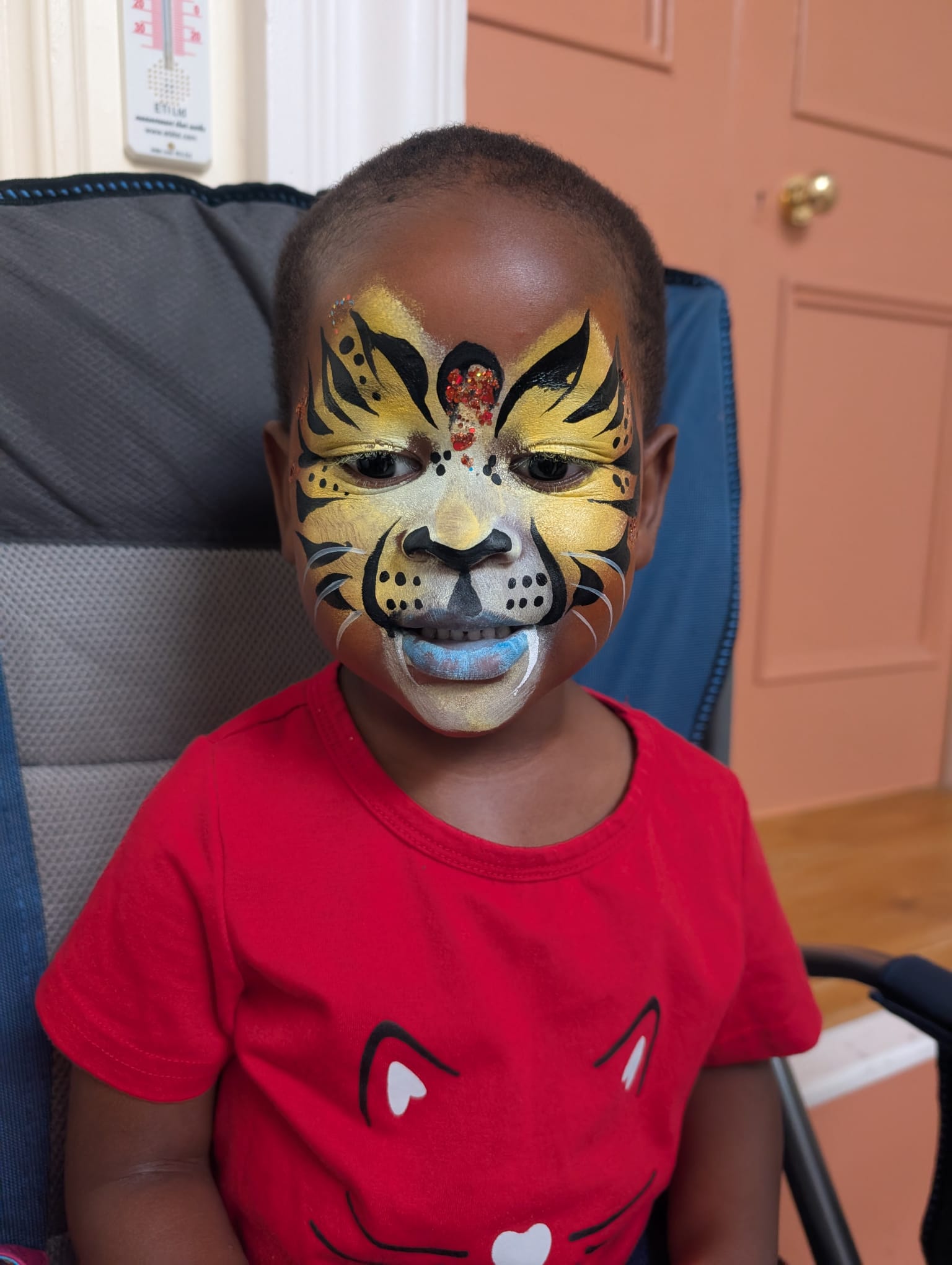 Gold tiger face paint for boys
